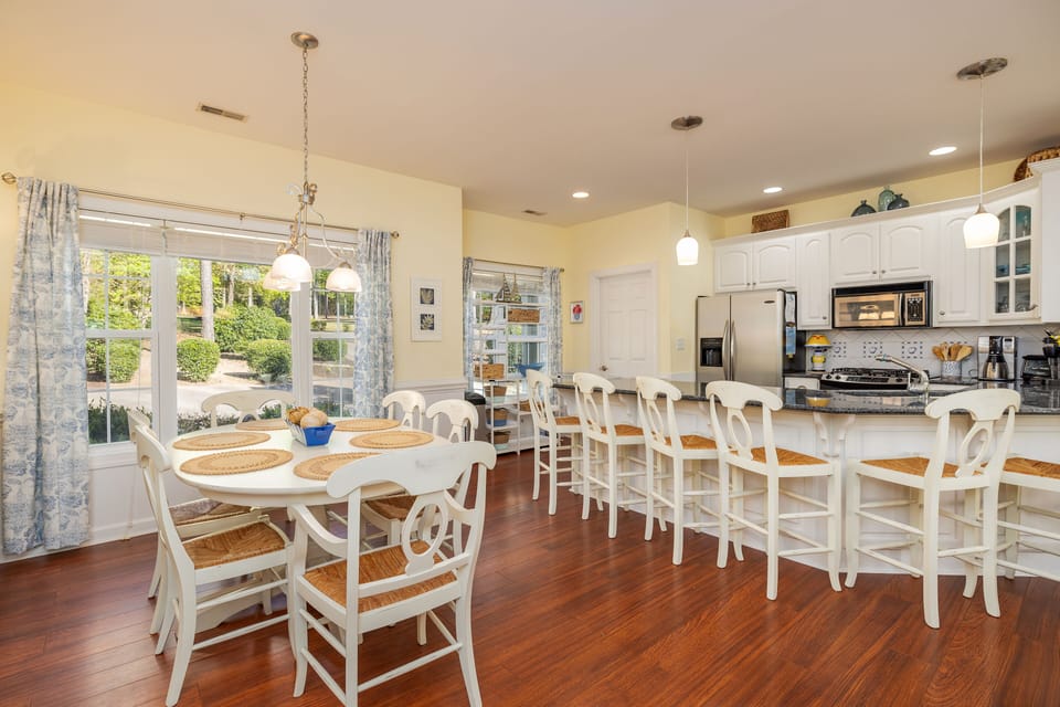 Kitchen counter seats and dining table