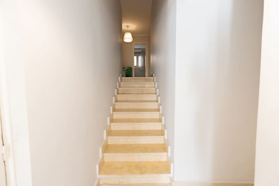 Hallway that takes you to another sitting room