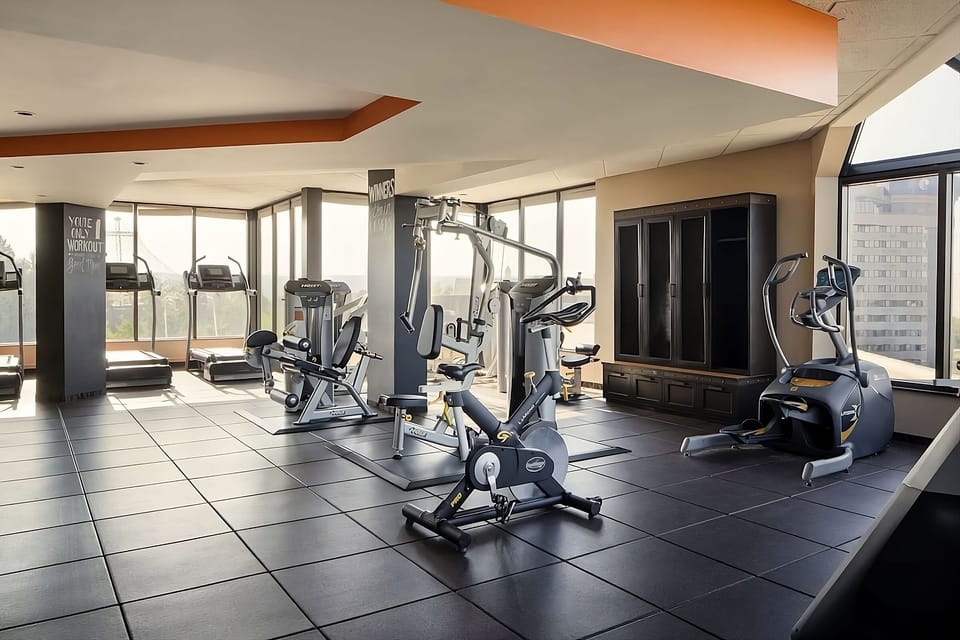 Energize your day with a bright gym and cardio machines.