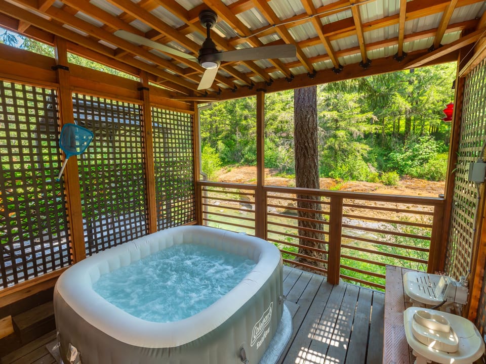 Exclusive-use hot tub with River view.