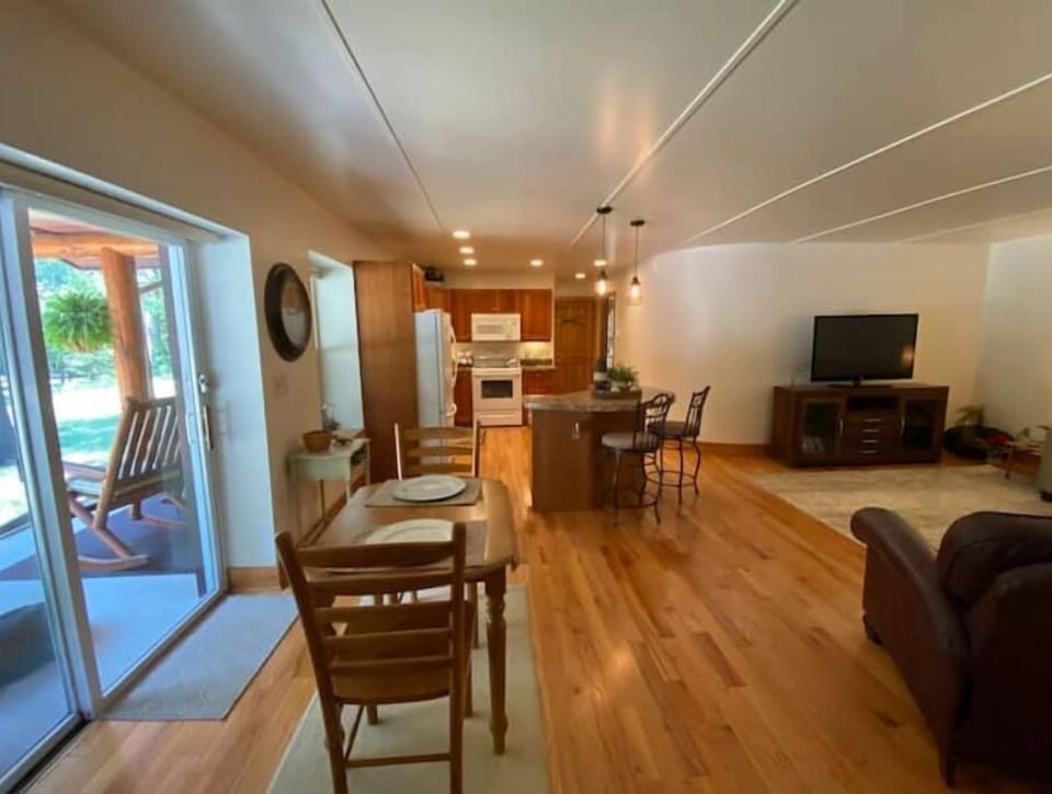 Coming in from door.  Can add chairs for4 at dining table.