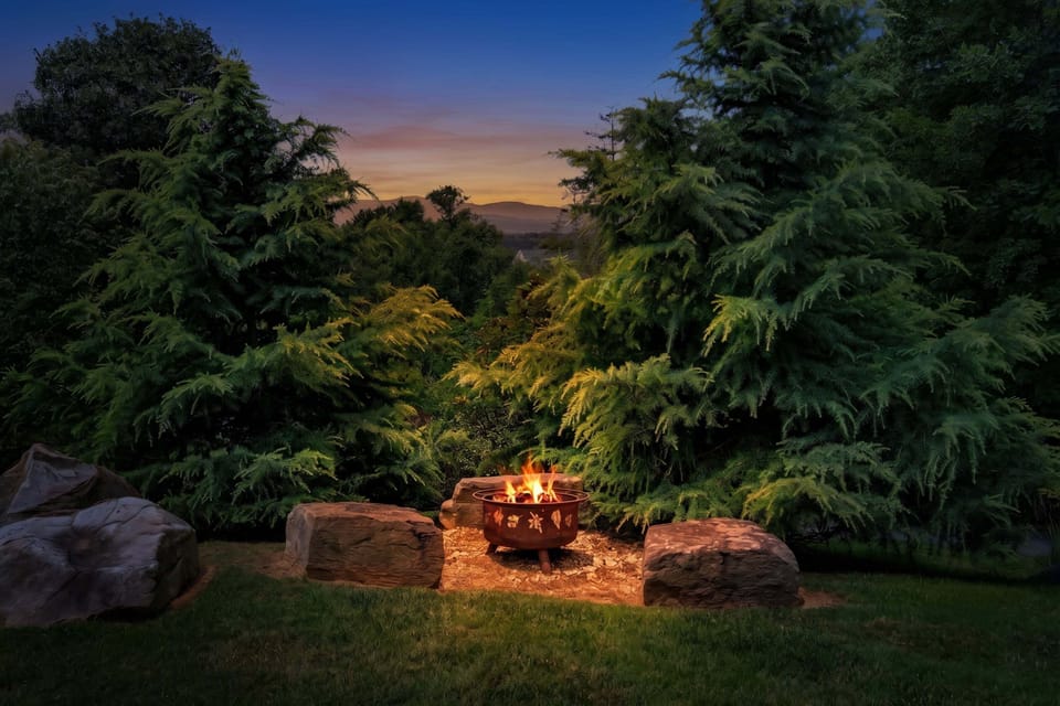 Wood-burning fire pit with natural stone seating