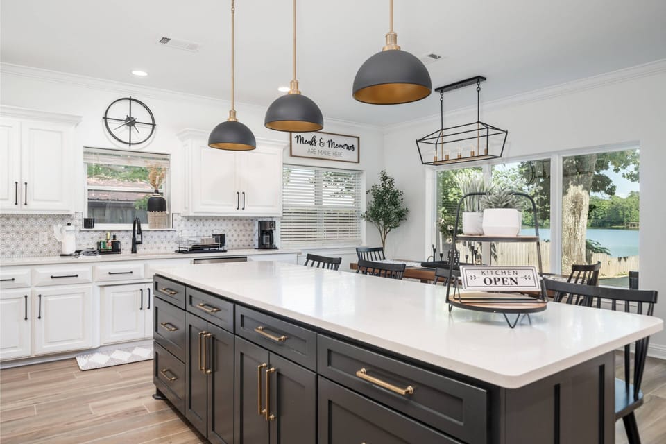 Open Concept Kitchen overlooking lake & pool