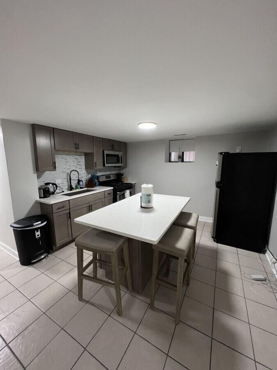 Kitchen w/ bar stools