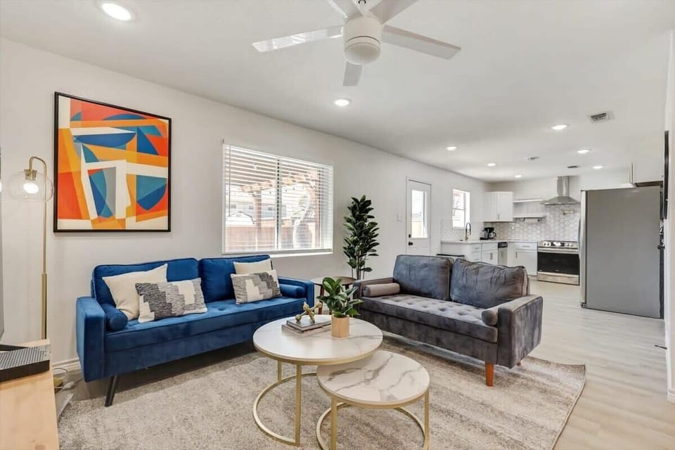 Featuring an elegant air of “posh meets modern”, this living room is perfect for catching up with family and friends.