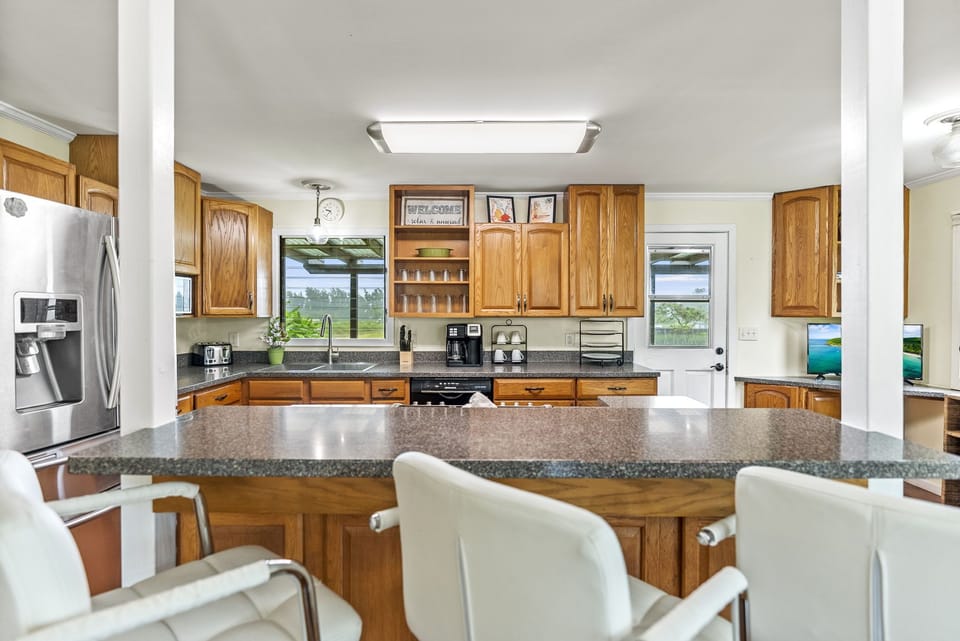 Pull up a stool at the kitchen island and chat with the chef while meals come to life.