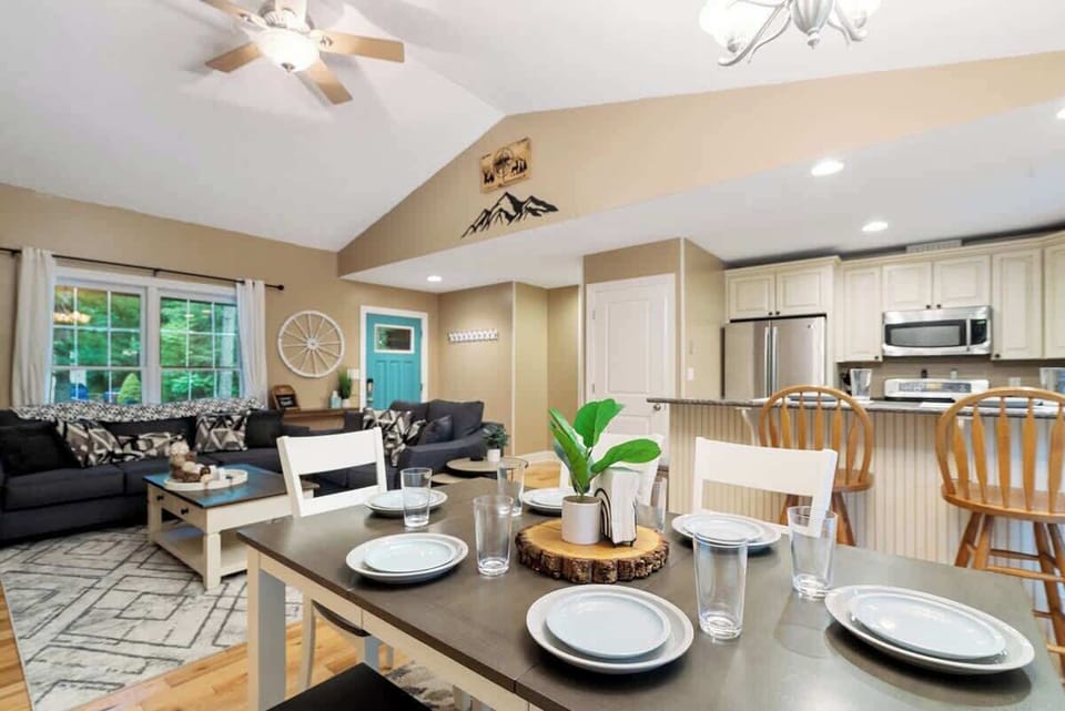 View of the living room, dining room, and kitchen