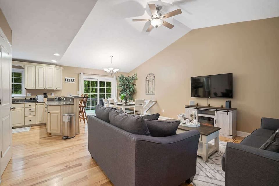 View when you enter front door, living room, dining room, kitchen.