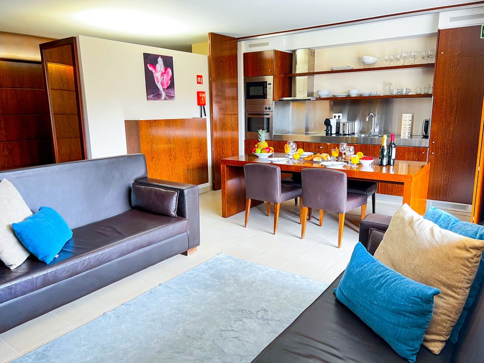 Living room with kitchenette.