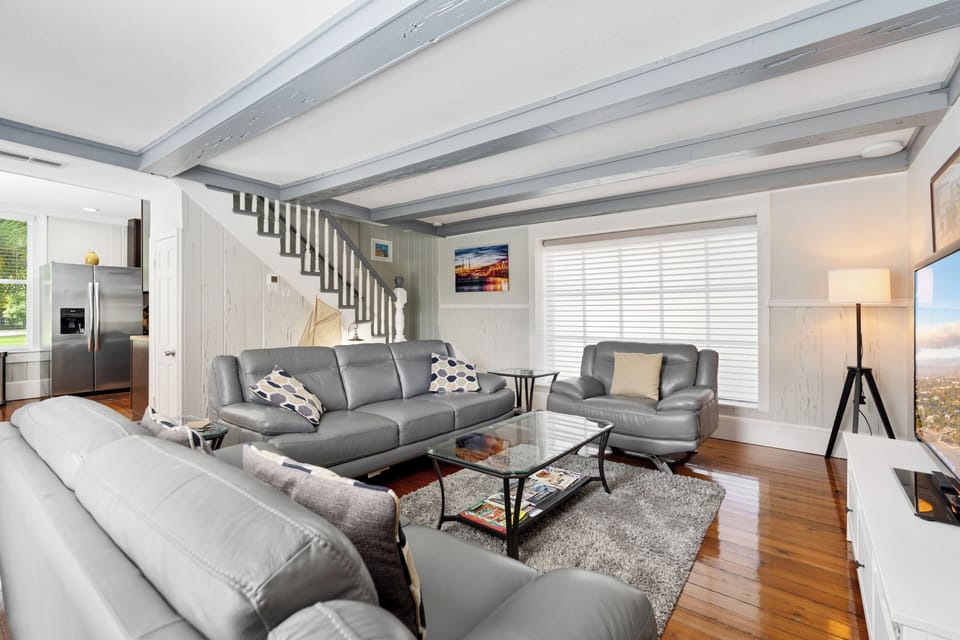 Living room and stairs to the two upstairs bedrooms.