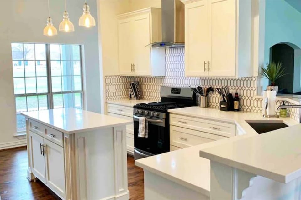 Fully stocked gourmet kitchen with gas stove. 