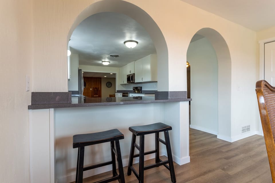 Dining room has two island seats.