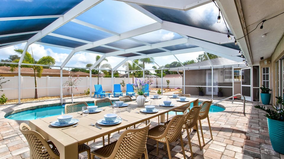 Dine with a view — enjoy your meals overlooking a sparkling pool in a serene backyard setting!