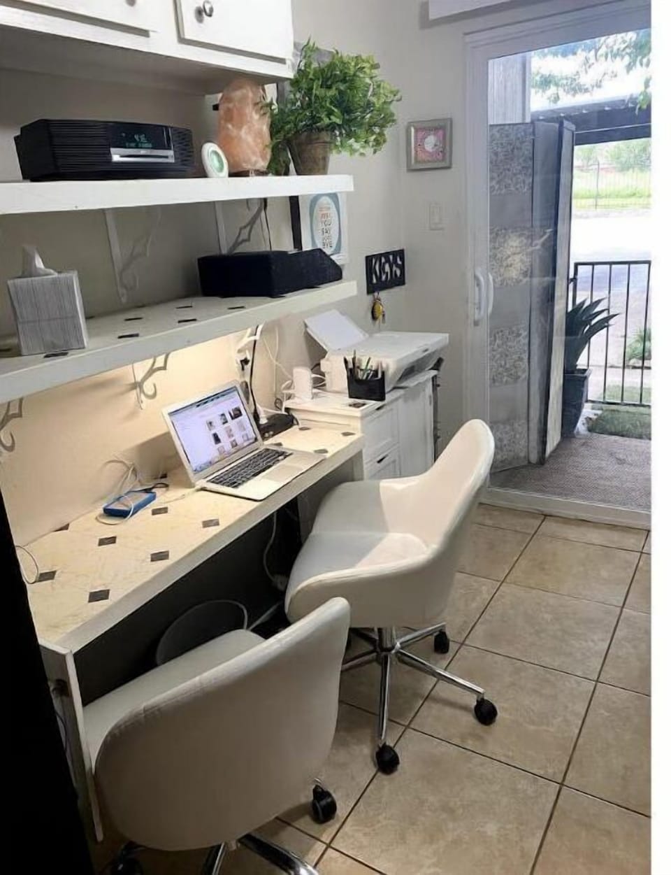 office (coming in from back gated patio -carport side)