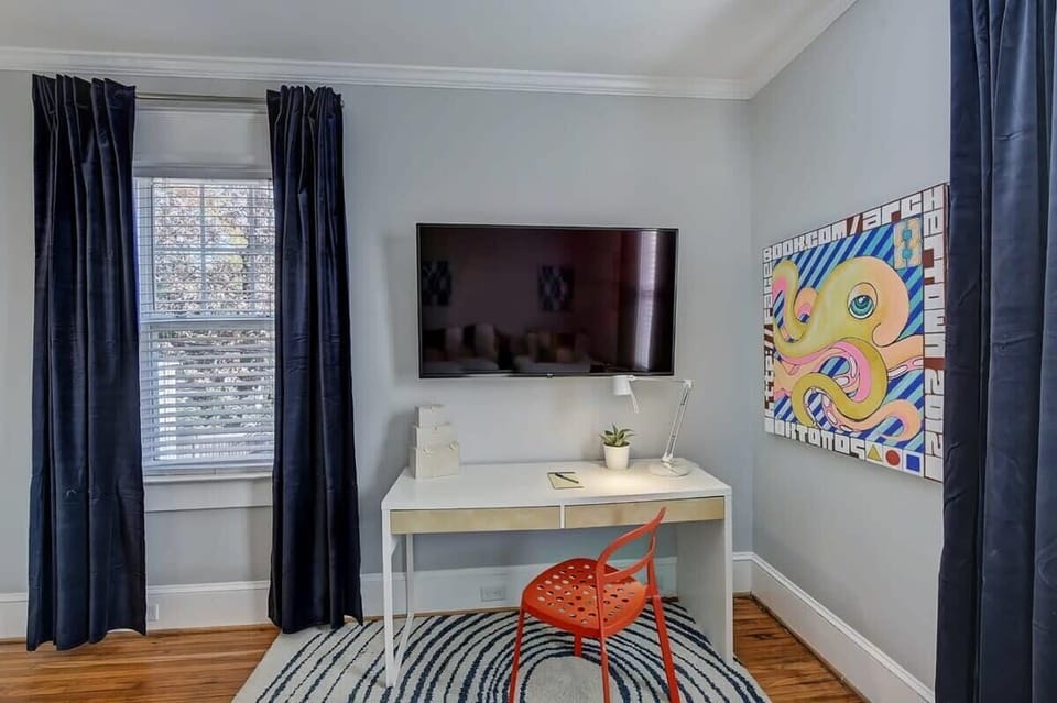 Roku TV with table and chair for studying/office work