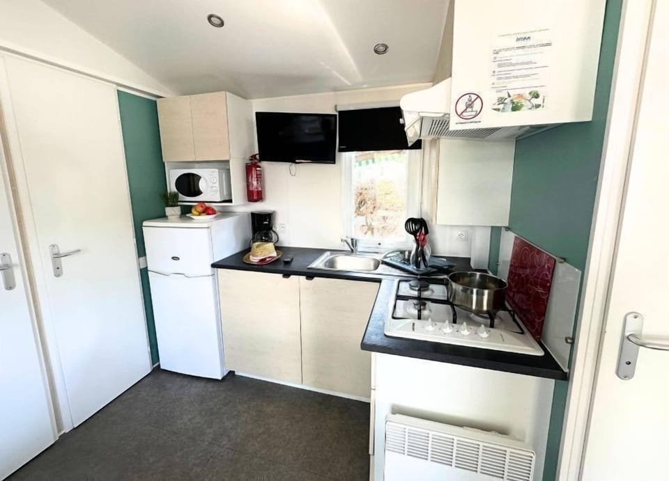 A modern kitchenette for easy meal prep.