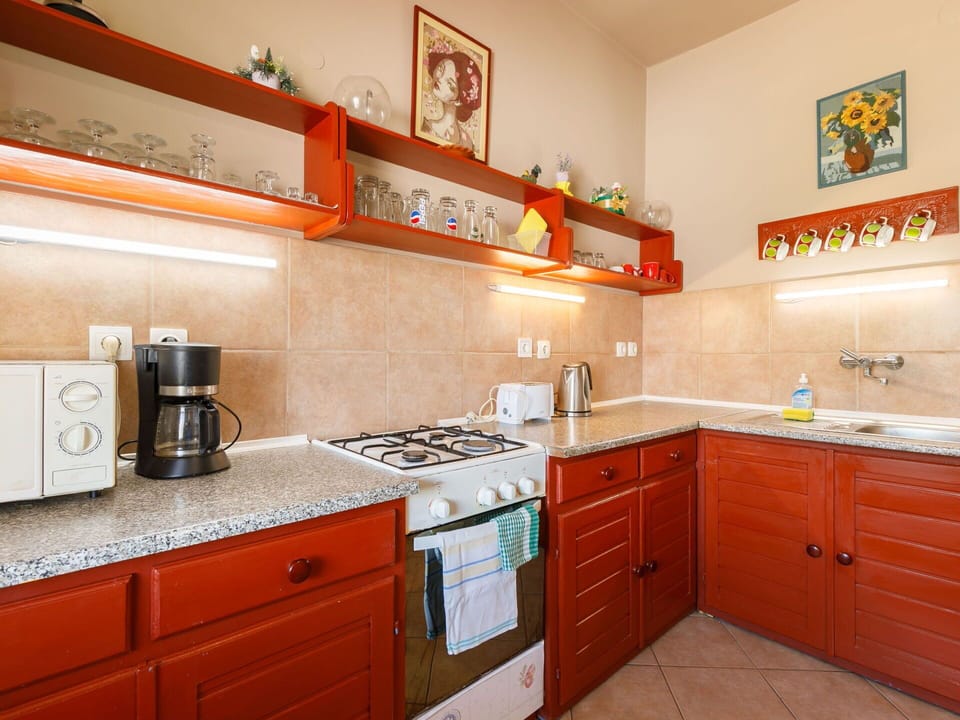 Kitchen, Kitchen Appliance, Major Appliance, Countertop, Cabinetry, Wood, Interior Design, Kitchen Stove, Flooring, Home Appliance