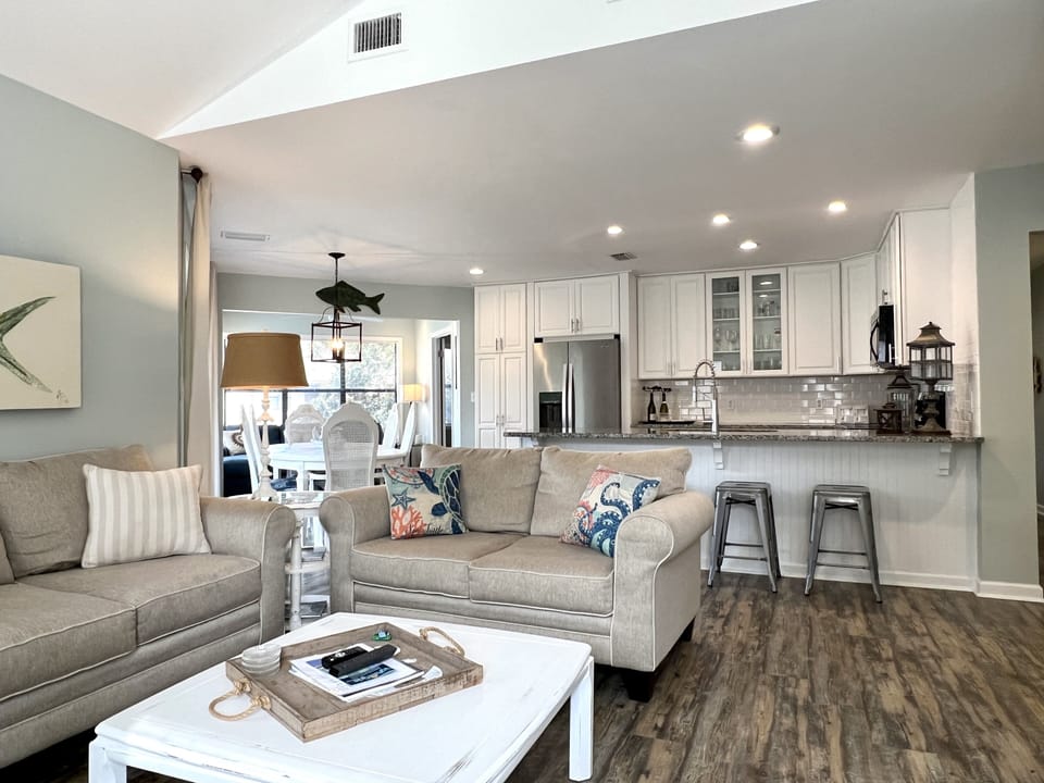 The cozy living room has two (non-sleeper) sofas. 