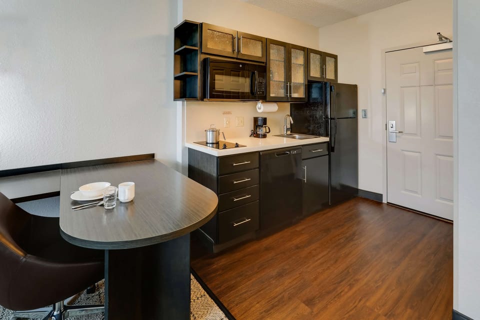 Start mornings with coffee and a handy in-room dining spot.