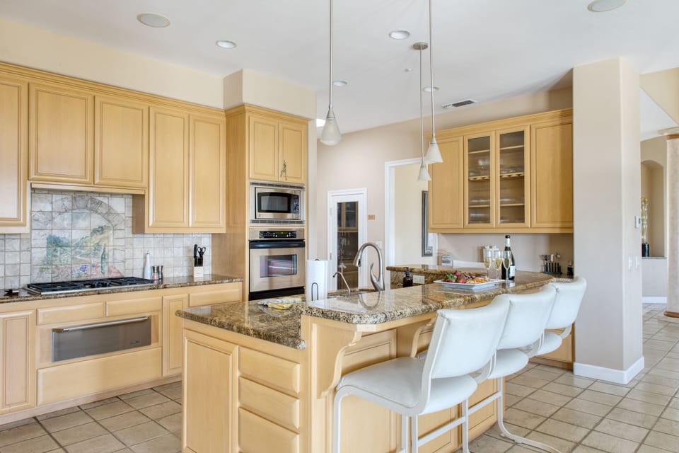 High-end appliances and plenty of prep and storage space in the kitchen.
