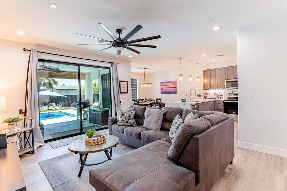 Enjoy an open-plan living space with direct access to the patio and pool.