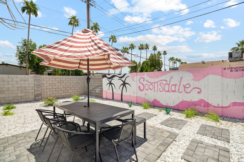 Escape the hustle of the day in the back yard oasis!
