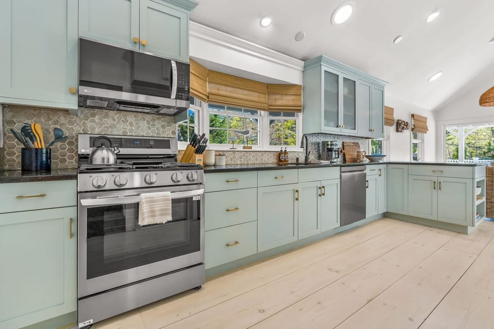 A contemporary kitchen, equipped to showcase your culinary skills, is ready for you.