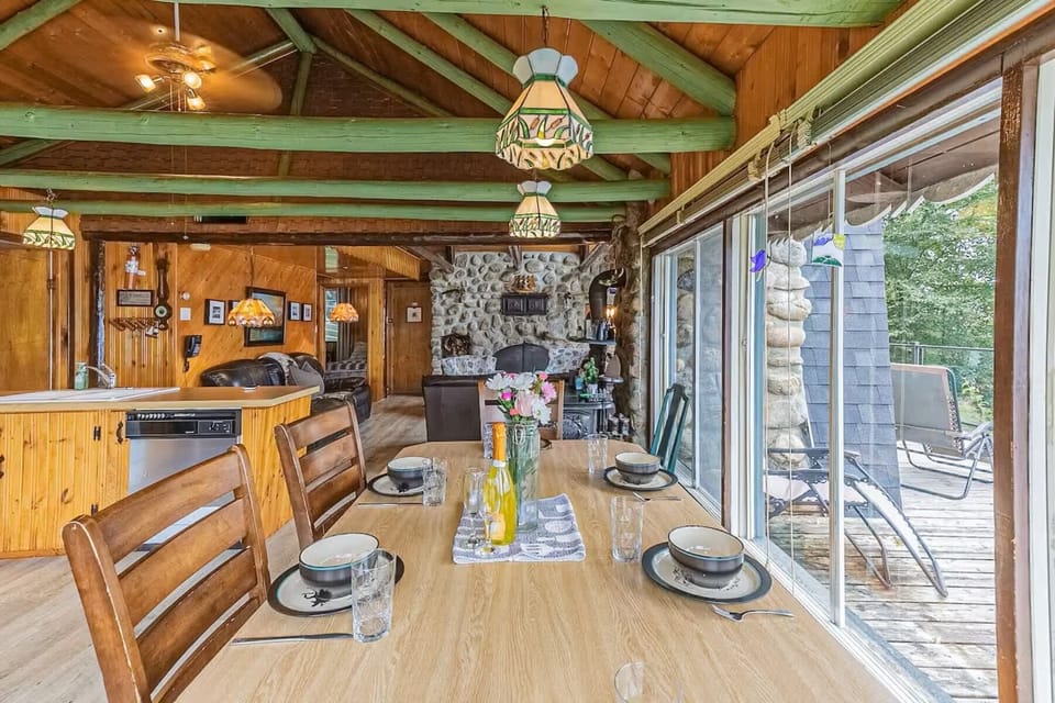 Dining area blending natural wood and stone for cozy meals