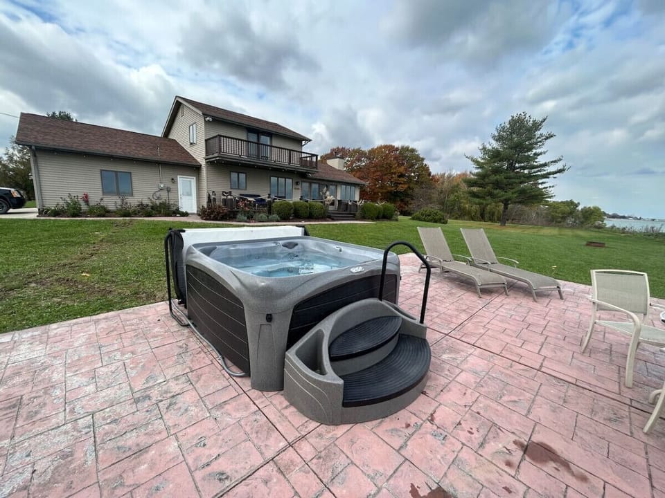 Relax in the brand new hot tub overlooking Lake Huron