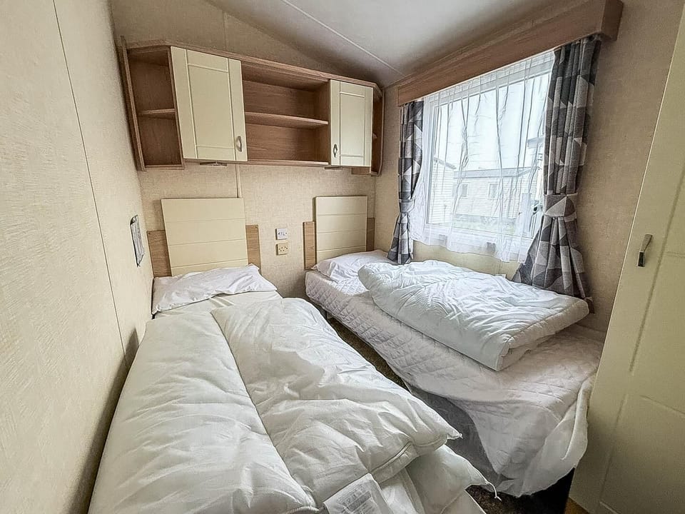 It’s easy to return to your caravan and settle into a cosy twin single bed.