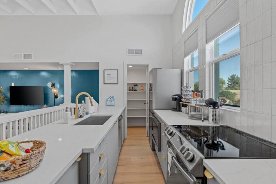 Discover a culinary haven in our fully equipped kitchen. Unleash your inner chef with modern appliances and ample space to create delicious meals.