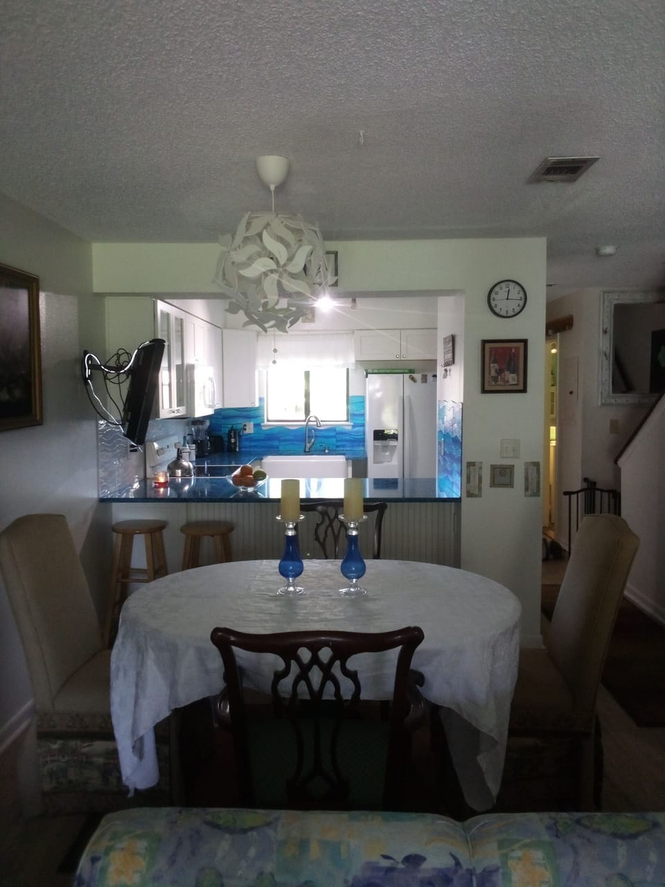 Dining room into kitchen with bar seating