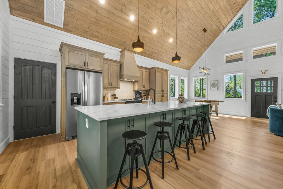 The oversized island has seating for five.