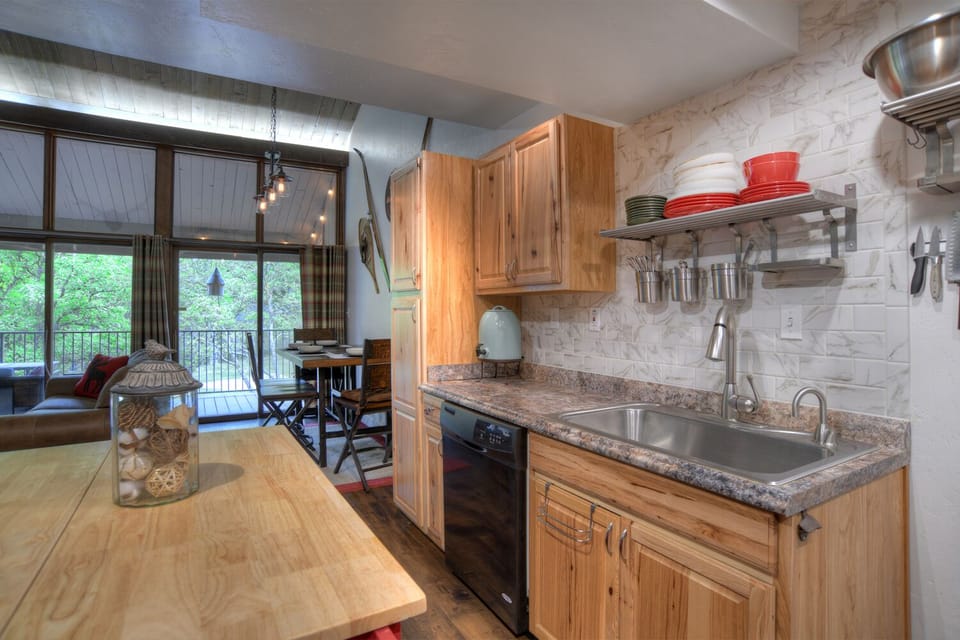 Fully Stocked Kitchen with Kitchen Island and Breakfast Bar Seating