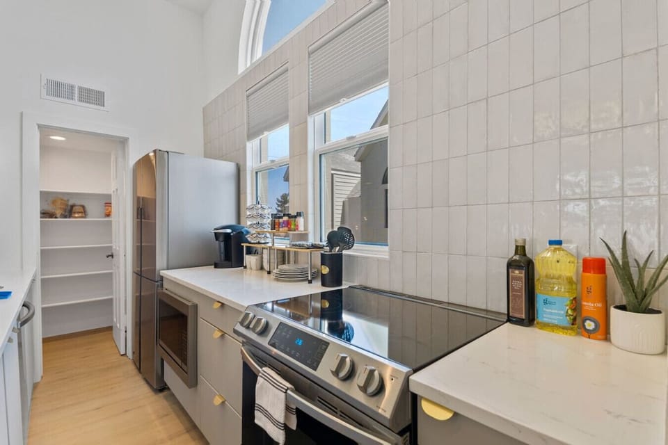 Discover the joy of cooking in the simple yet well-equipped kitchen, complete with a fridge, microwave, and coffee maker. Experience convenience and culinary delights, making your stay a truly great experience.