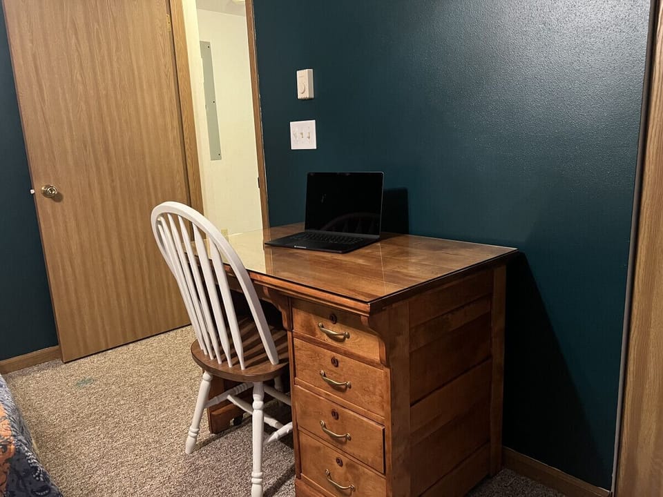 Desk for remote work in bedroom with Queen sized bed (Lap top not included in rental)