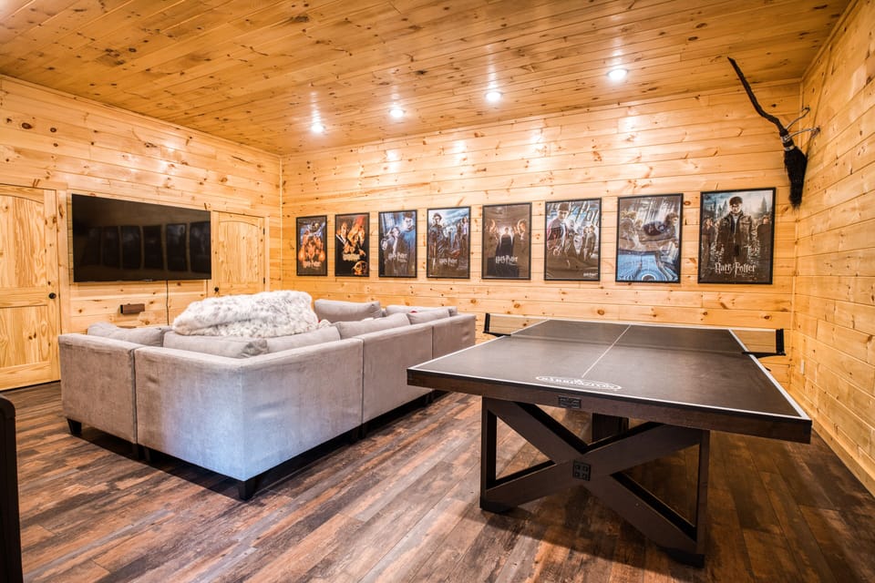 Make your way to the movie room, with a 75 inch TV and ping pong table.