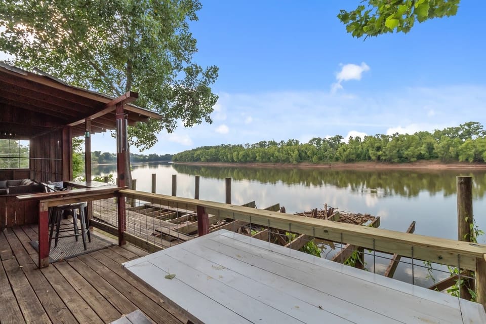 Picnic table for outdoor dining on the River- we are currently rebuilding the deck to expand it on the other side of the railing. 