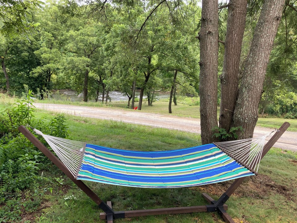 Have a nap across from the river in the hammock.