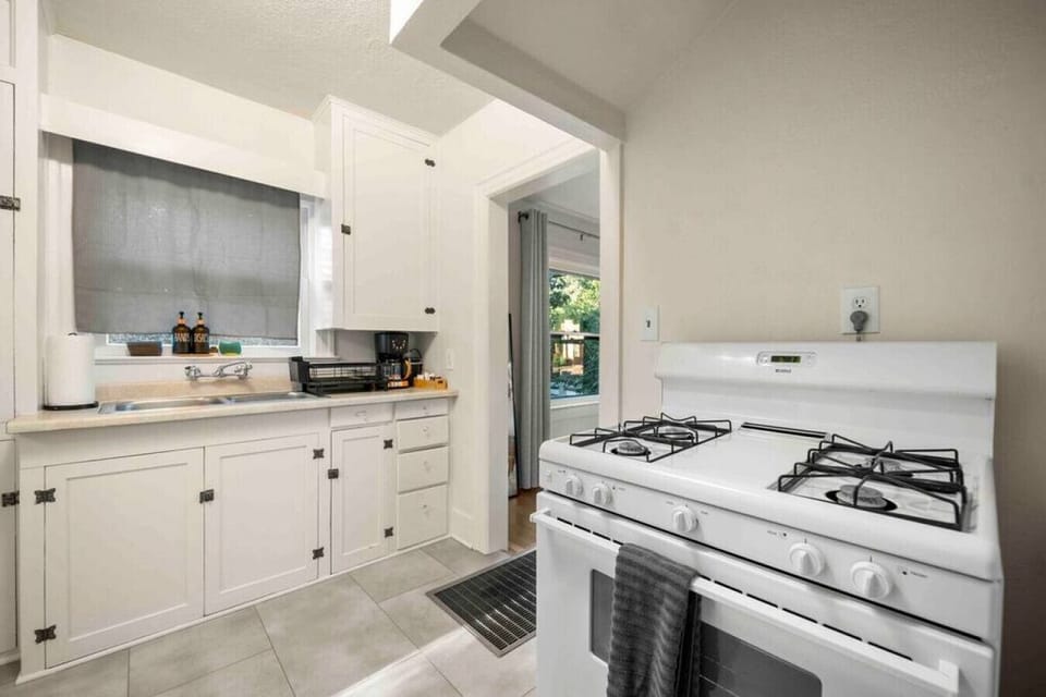 The kitchen area with new stove and oven