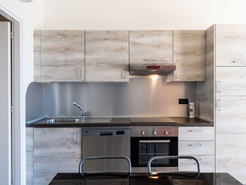 Kitchen, Countertop, Cabinetry, Wood, Kitchen Appliance, Furniture, Interior Design, Flooring, Major Appliance, Home Appliance