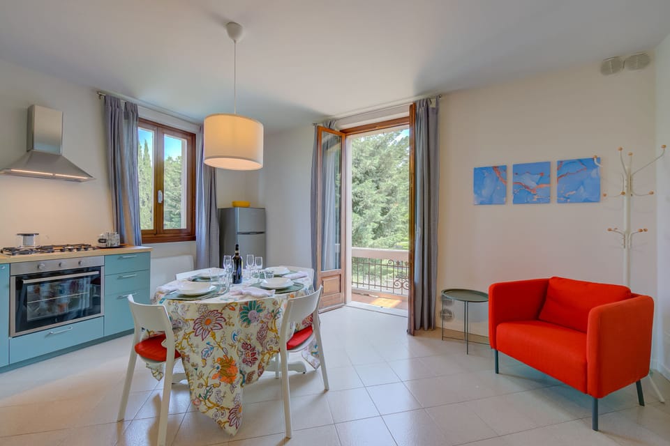 Living room with dining table and kitchen