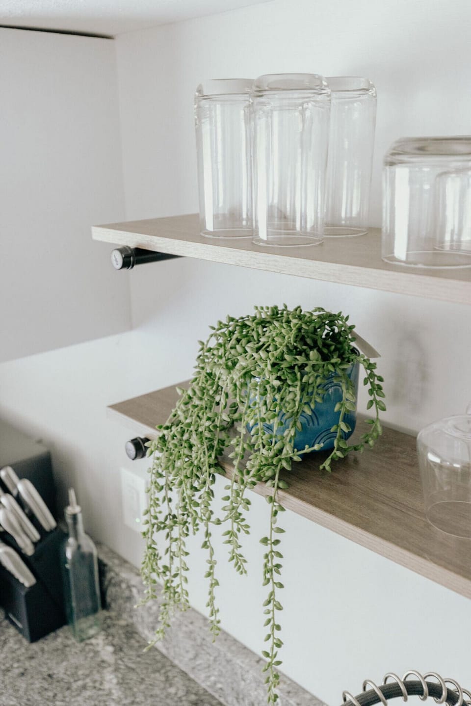 Fresh greenery adds life and calm to the space.