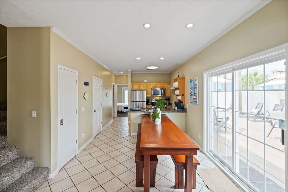 Large Farmhouse Table inside for everyone to gather at.