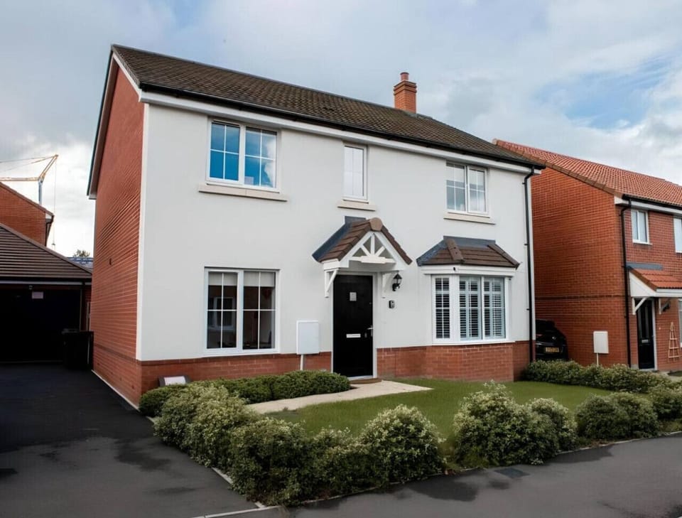 Exterior of your home away from home, with a welcoming front garden.