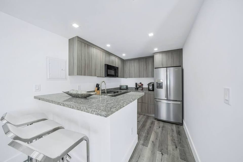 Fully Renovated and Equipped Kitchen. Marble tops and spacious cabinets to store all your family needs