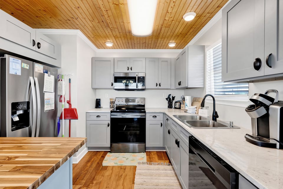 The kitchen was recently remodeled and offers stone counters and stainless appliances
