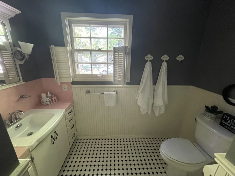 Main floor bath with tub/shower combo.