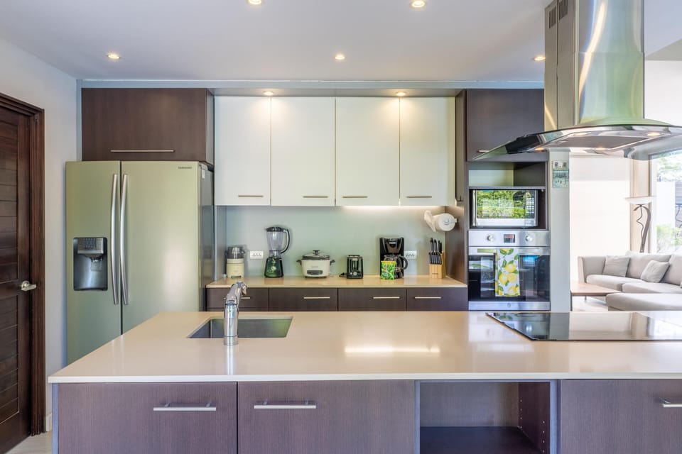 Open kitchen, stainless steel appliances