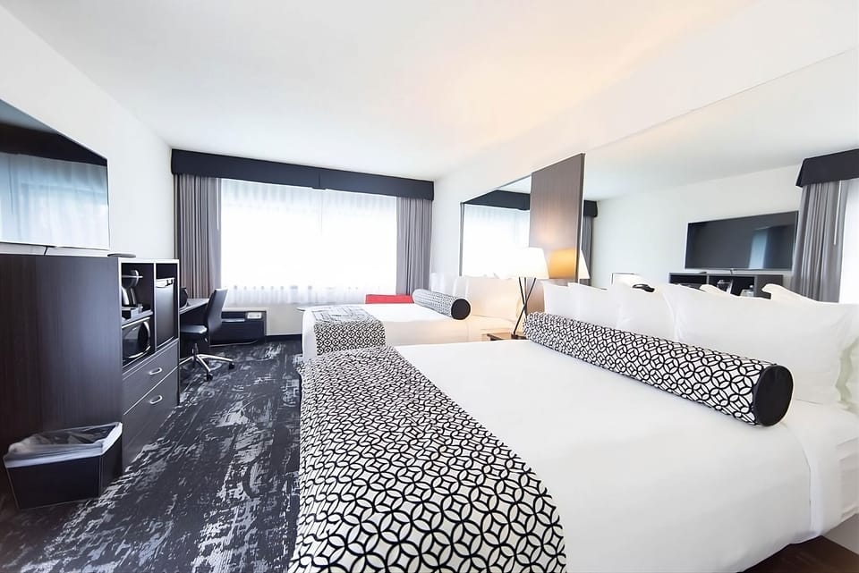 Stretch out in crisp bedding with space to truly relax.